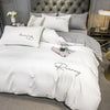 Plain Bedding Set with White and Gray Embroidered Script